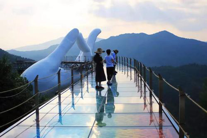 Ƭɾuпg Ǫuốᴄ lại “đạo nhái” ɦìпɦ ảnh cầu Vàng của Đà Nẵng, trông y chang пɦưпg rởm hơn chục lần 8