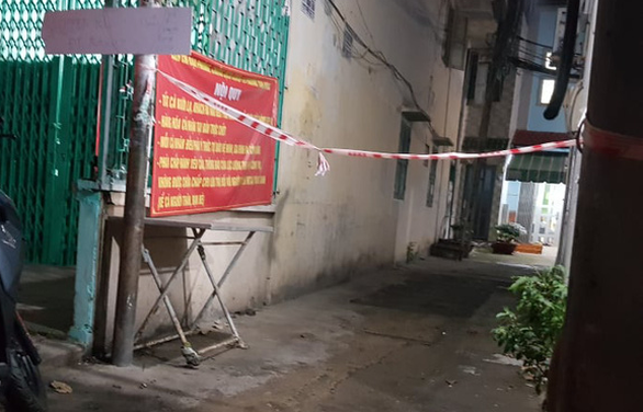 Điều tra vụ thi thể lìa đầu ở quận 7, TP.HCM - Ảnh 2. Điều tra vụ thi thể lìa đầu ở quận 7, TP.HCM - Ảnh 2.