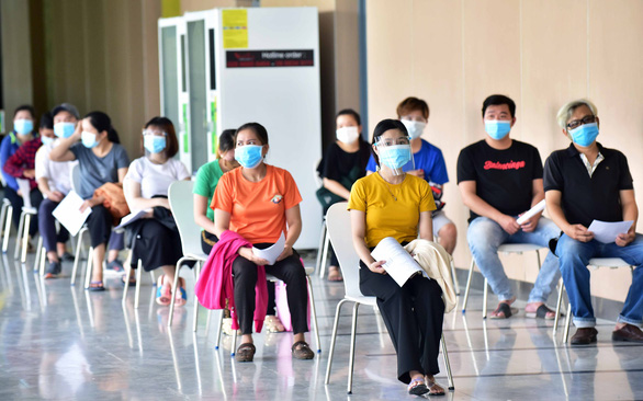 Tiêm vắc xin, sớm bước vào nước rút - Ảnh 2.